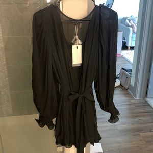 Black flowy romper from Vici